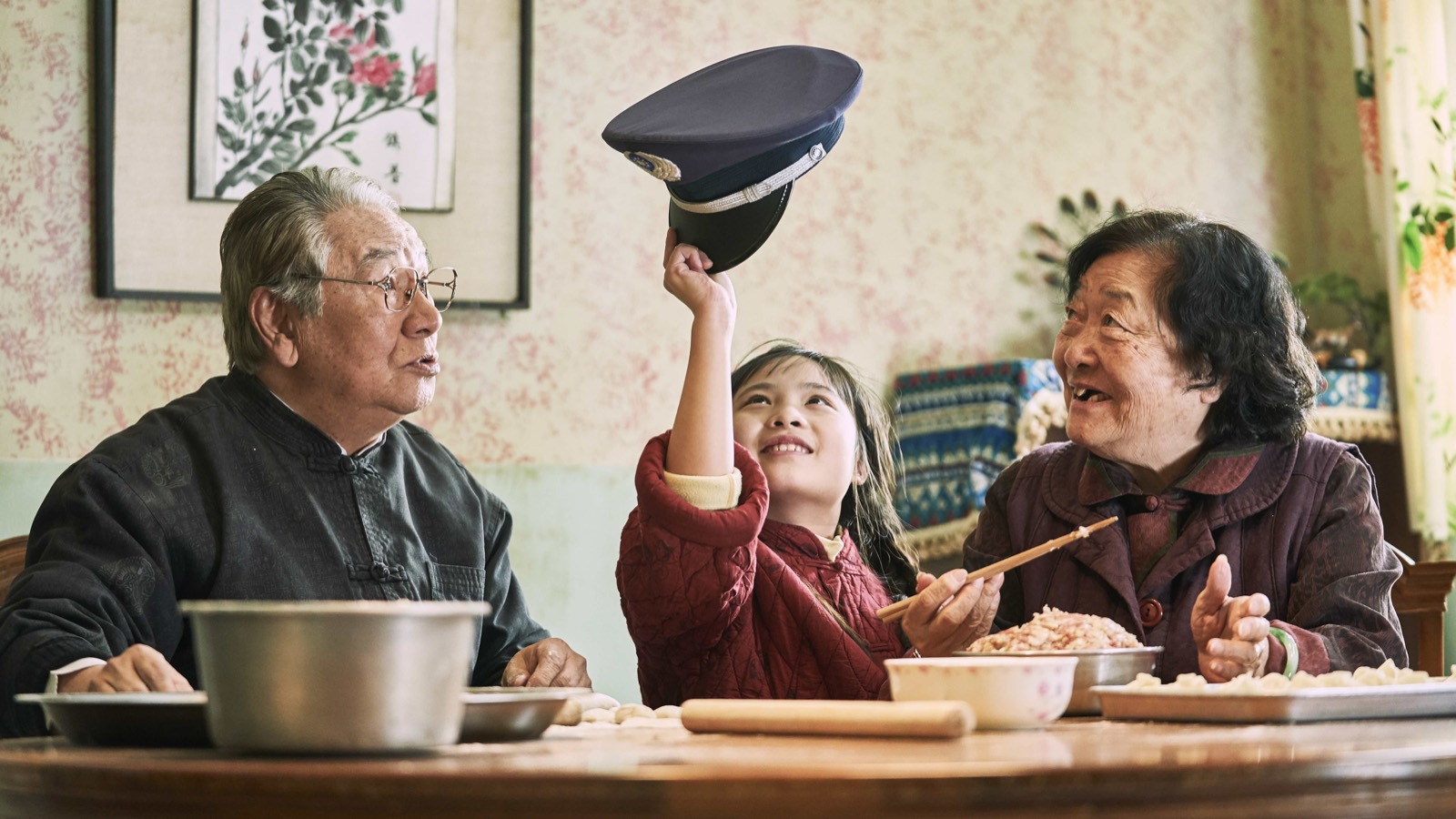 Yang Lan at the New Year’s Eve table with her grandparents