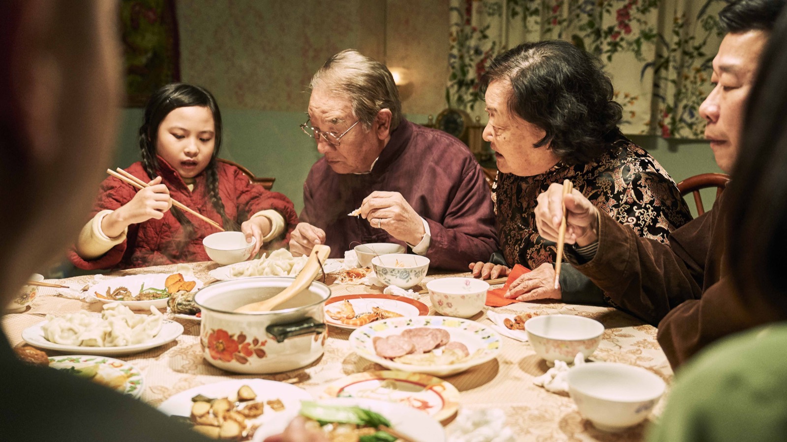 The family sharing New Year’s Eve dinner