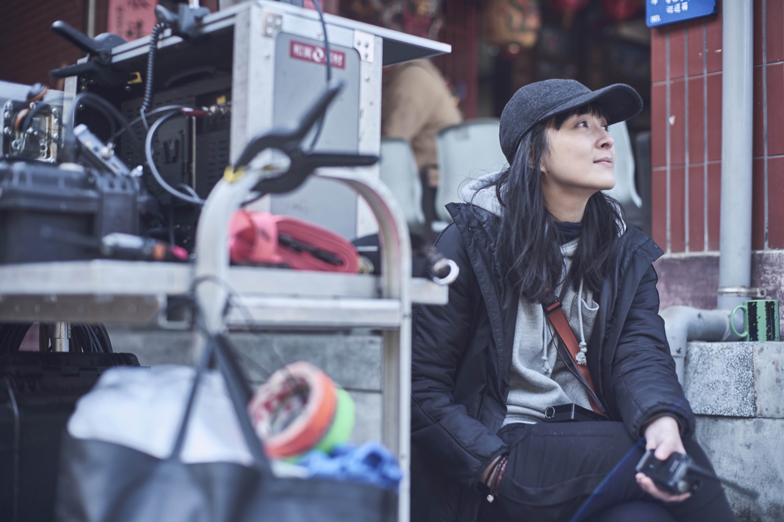 Jae Yang beside the camera on location